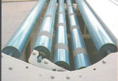 Open-ended beltless load cradle with roll improver