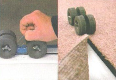 Chain-driven cutter making a straight cut in carpet
