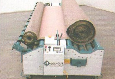 Carpet traveling across the Arrow tabletop for inspection