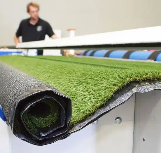 Accu-Cut customer cutting artificial turf. Accu-Cut customer cutting artificial turf.